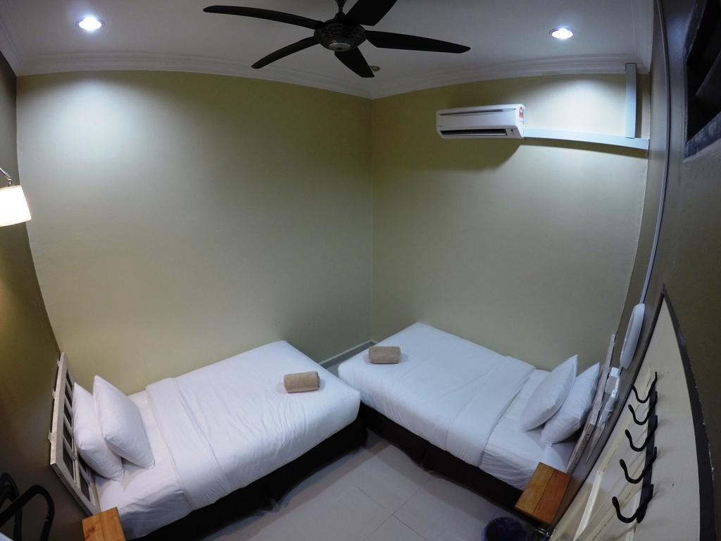 Wan's Beach Guest House Dungun Zimmer foto
