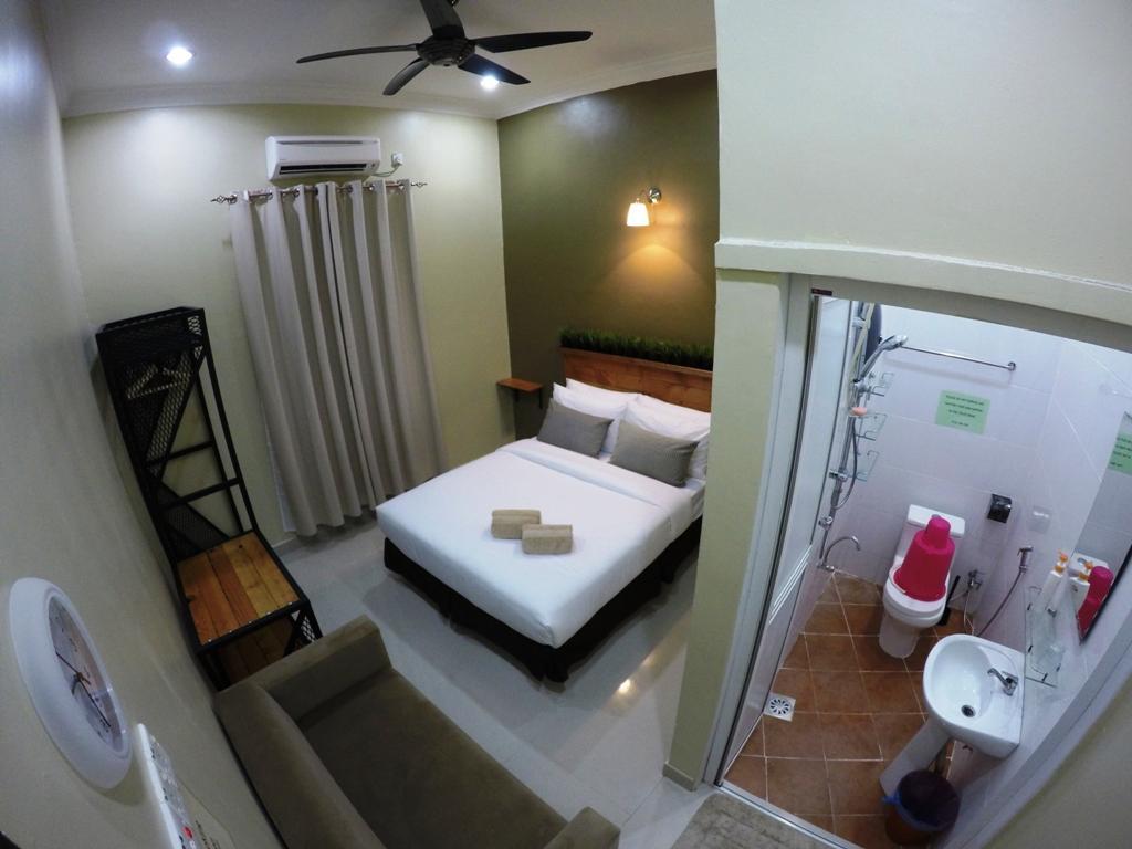 Wan's Beach Guest House Dungun Zimmer foto